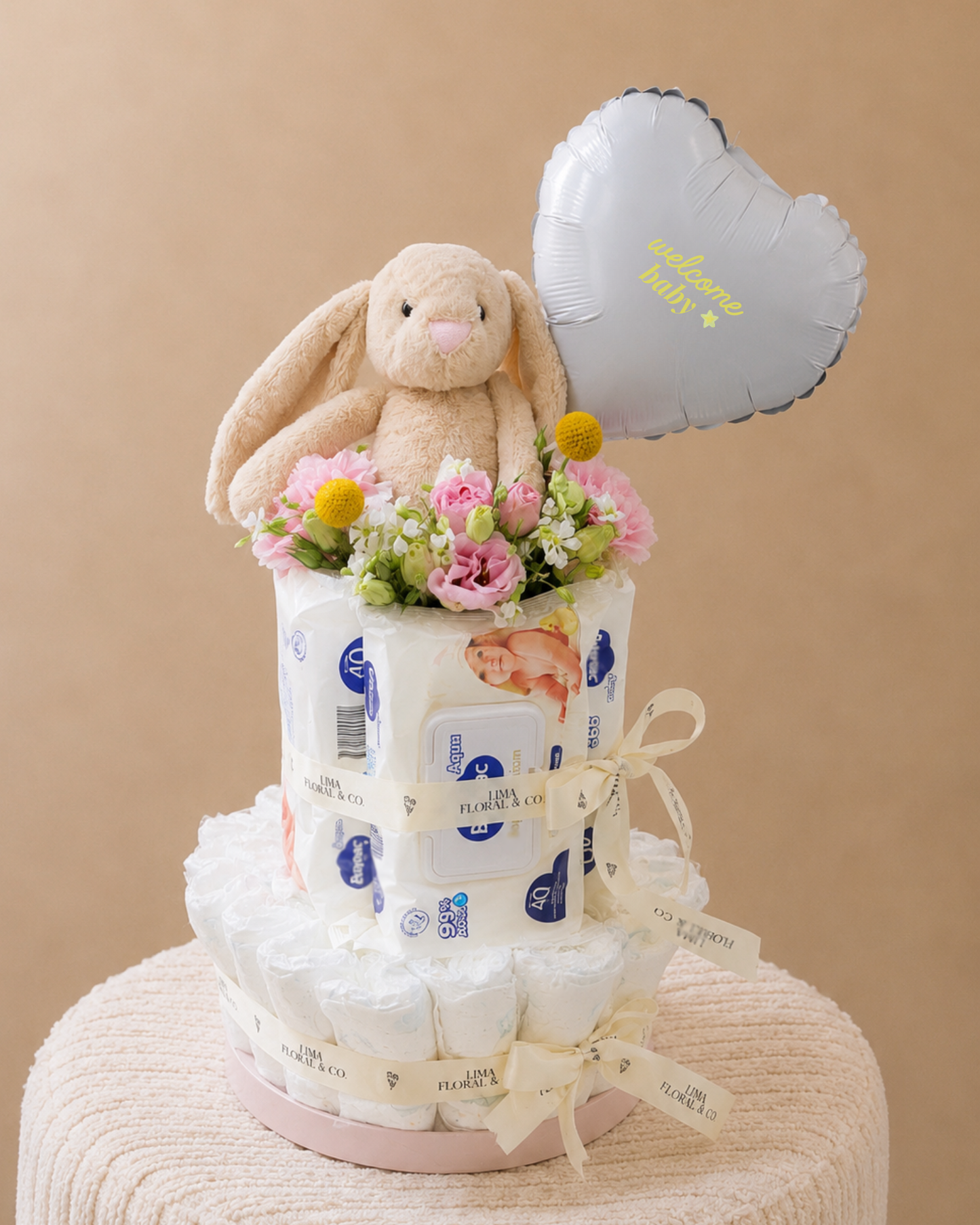 Torre de pañalas y pañitos: Welcome Baby