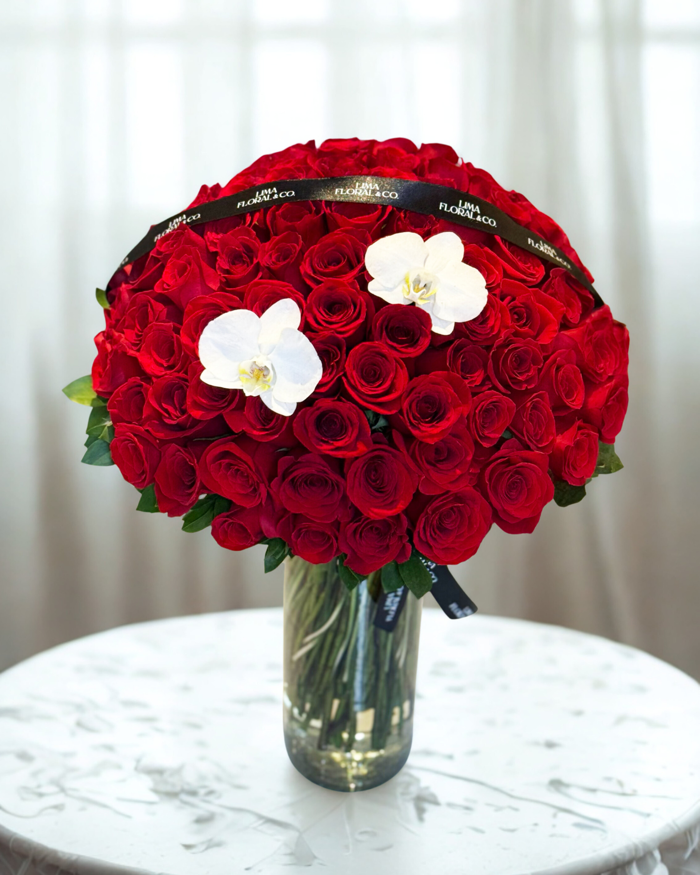100 rosas jarrón