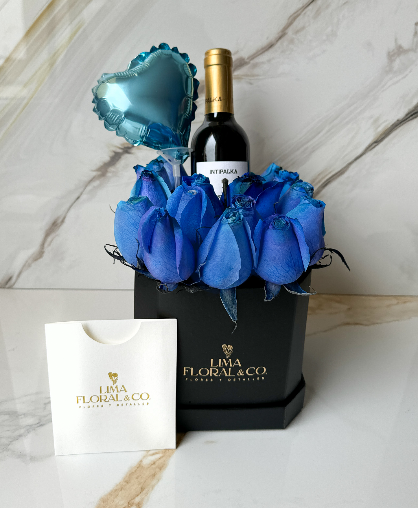 Mini Box 17 Rosas Azules + Vino Intipalka